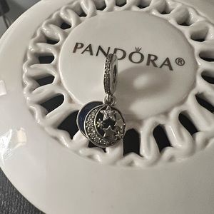 Authentic Pandora “love you to the moon and back” charm. Sterling silver/blue